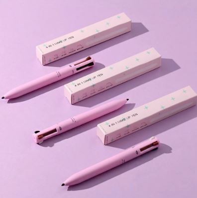 Three pink 4-in-1 makeup stylos with white rectangular boxes on a lavender background.