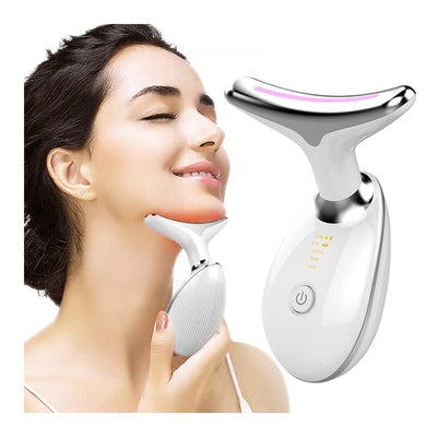 White microcurrent face and neck massager with LED indicators held by a woman against her jawline.